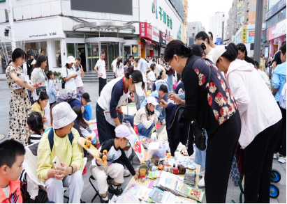 青岛市“义卖传爱同行 科技筑梦向光”第三届慈善义卖暨科技节活动温情落幕
